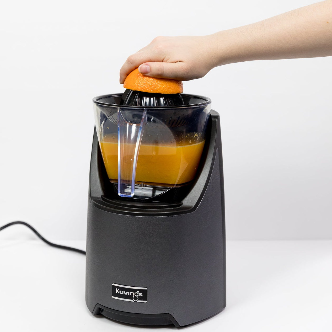 Person using the citrus attachment