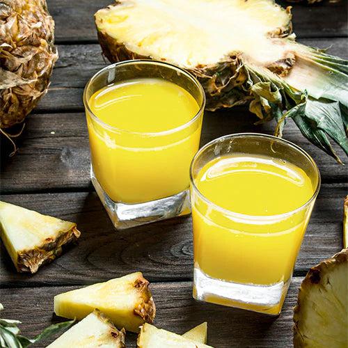 Yellow Pineapple Juice in two glass cups