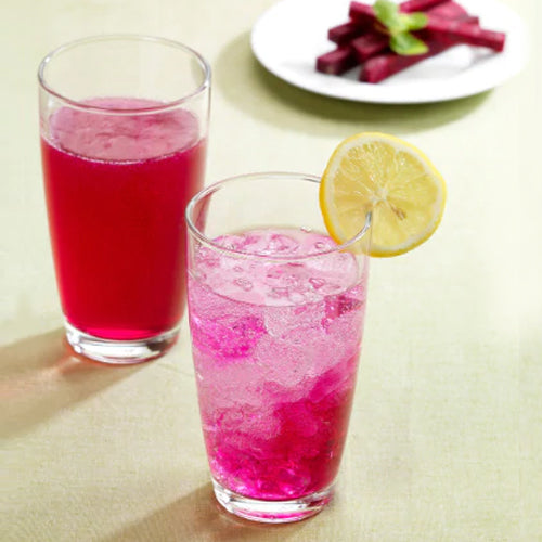 beet lemonade in two glass cups