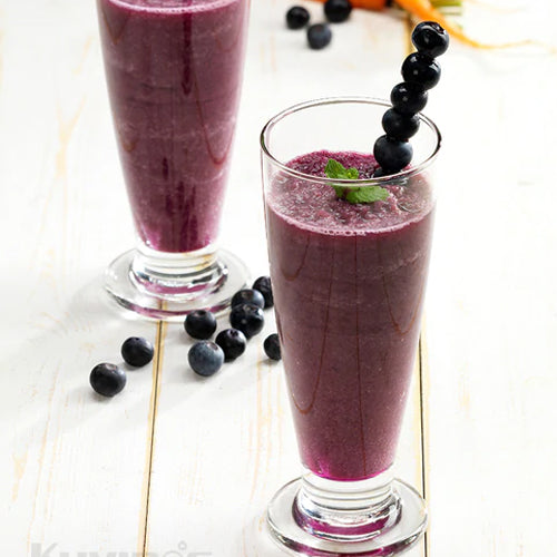 purple juice in glass cup with blue barry stick