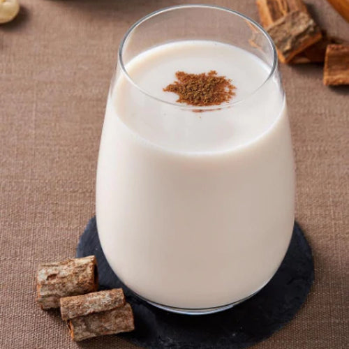 cashew milk in a glass cup