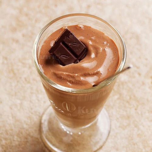 cacao avocado banana smoothie in a glass