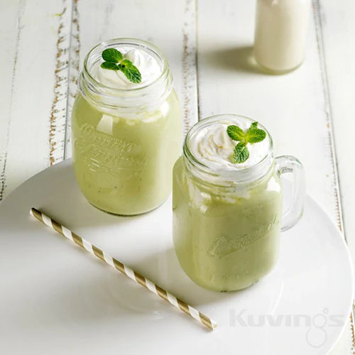 green tea smoothies on white surface