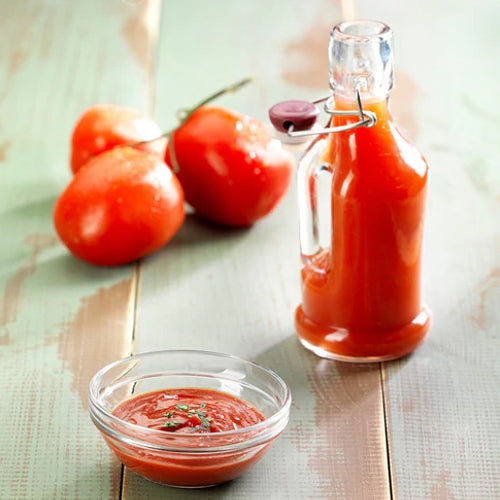 bottle of homemade ketchups with tomatoes