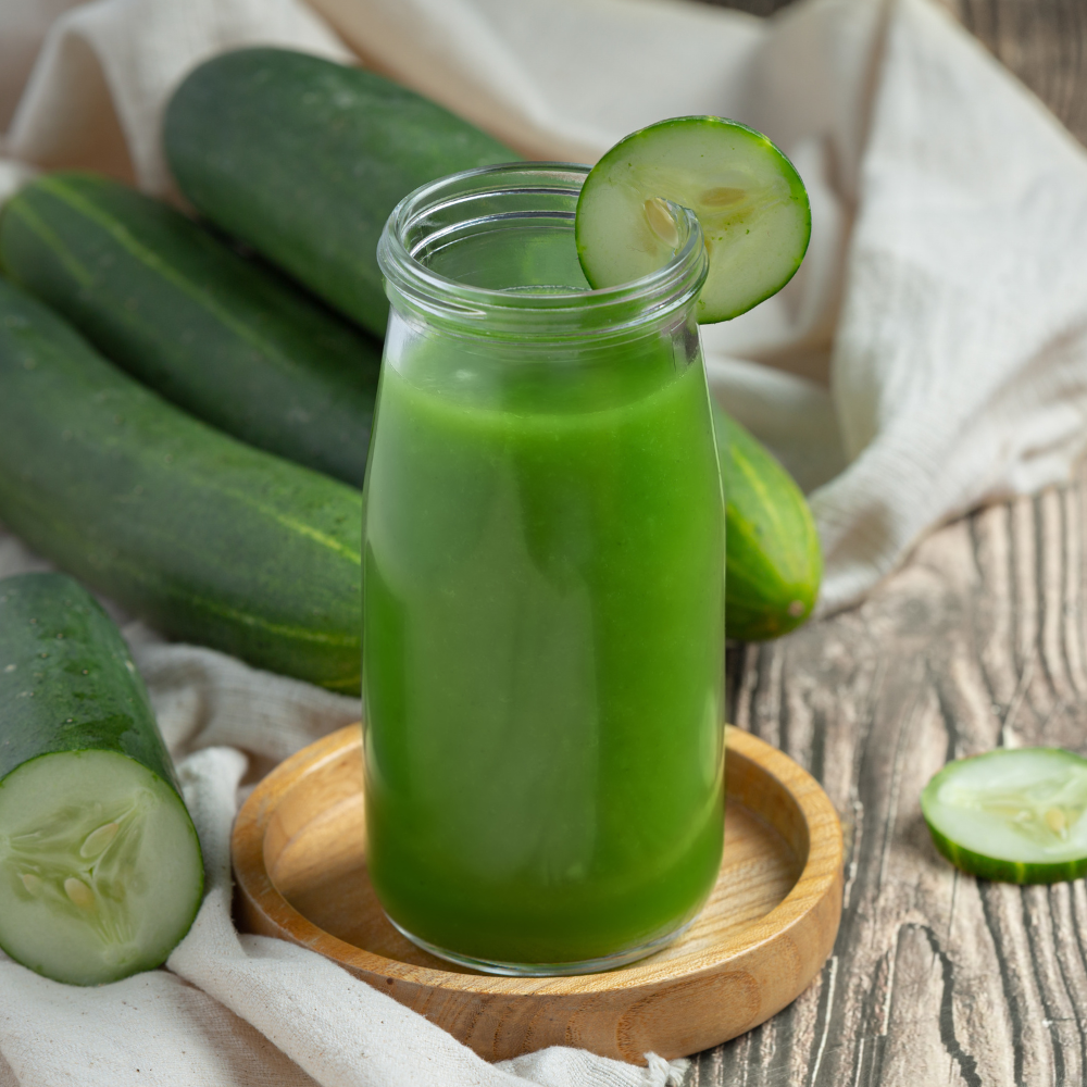 Cucumber juice, cucumbers, a cloth, and wood