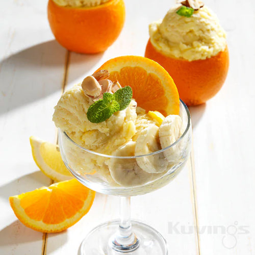 scoop of orange sorbet in a cocktail glass