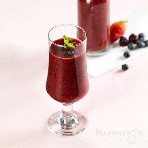 Berry Smoothie in glass cup decorated with blueberries