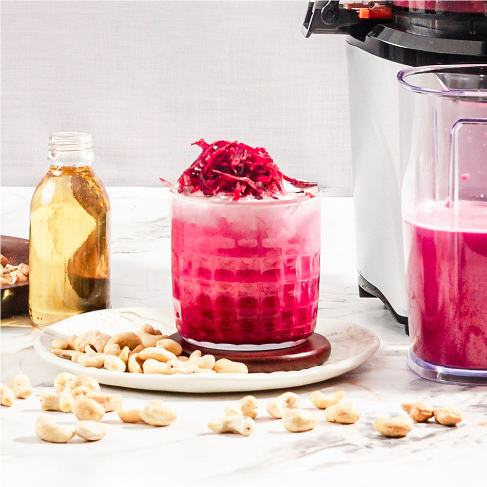auto10 juicer making beet cashew milk