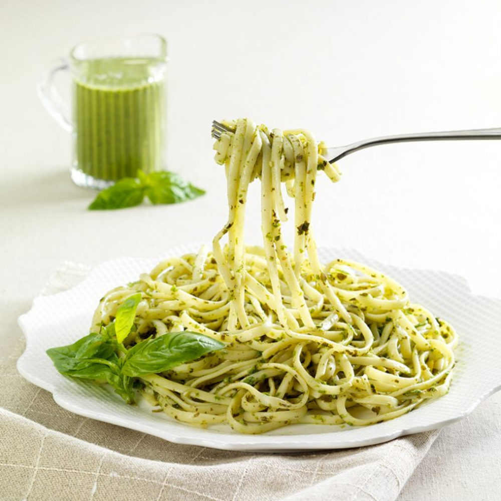 basil pesto pasta with a green smoothie
