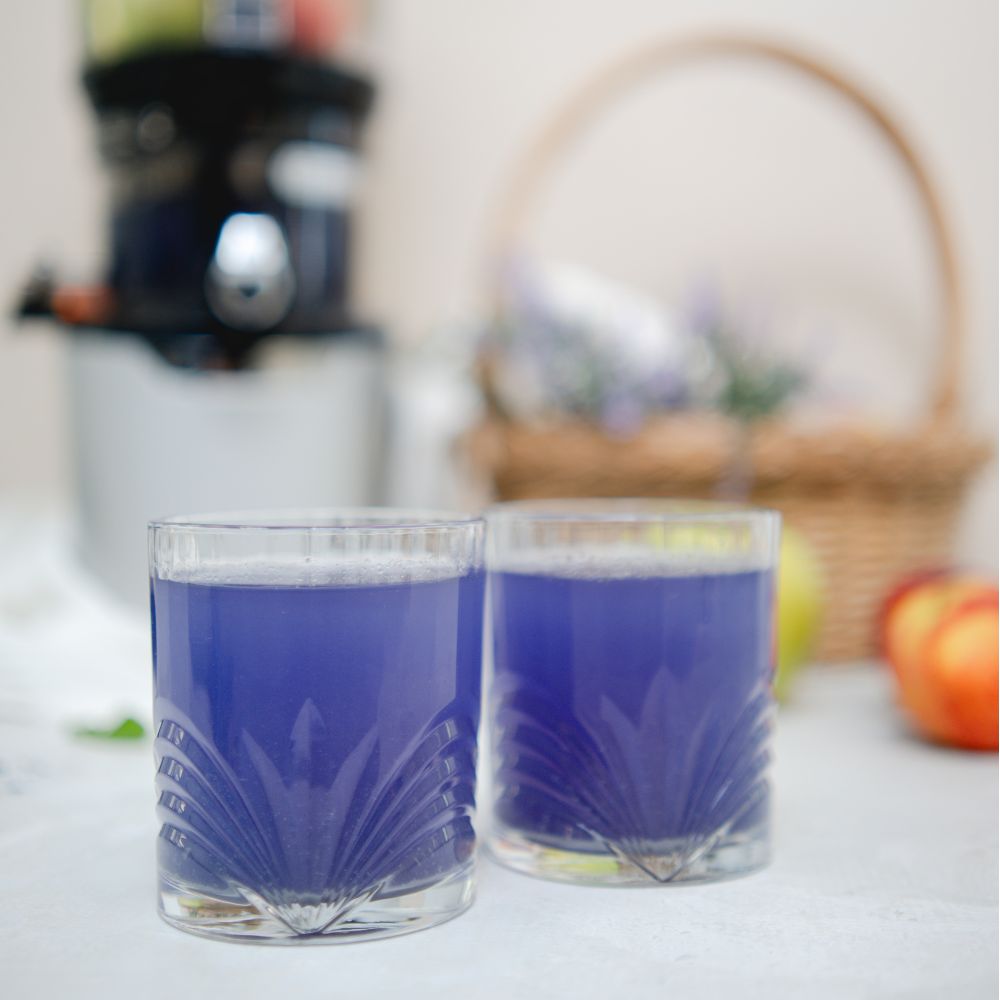 2 glasses of purple butterfly pea flower juice