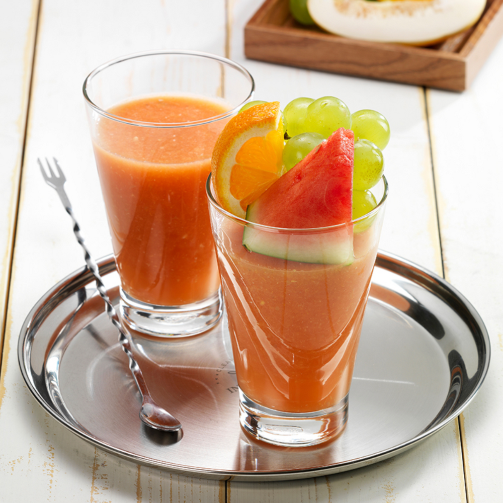 2 glasses of fruit juice on a tray